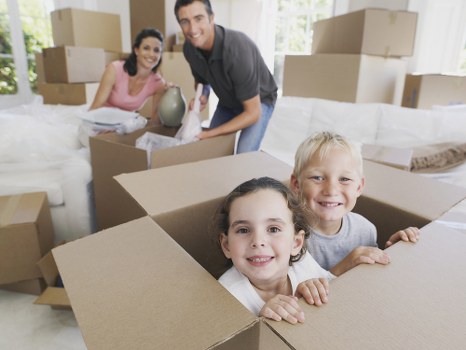 Professional office relocation services in Poplar with moving boxes and workspace equipment