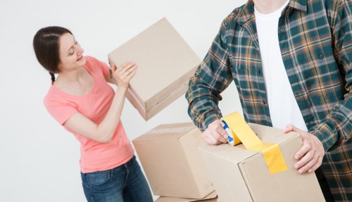 Packed office furniture and equipment for a Poplar commercial move