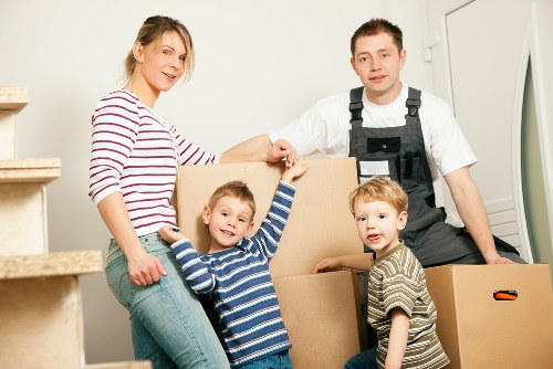 Local moving team providing packing services for a Poplar apartment relocation