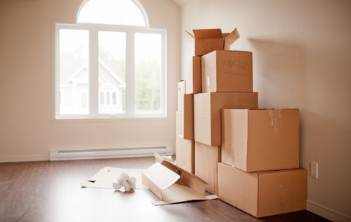 Professional movers handling office furniture in Poplar