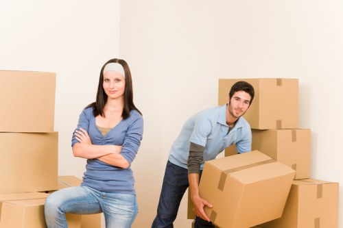 Careful loading of household items during removals in Poplar