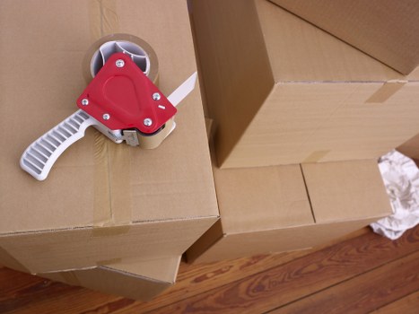 Removal van loading commercial items for a Poplar relocation